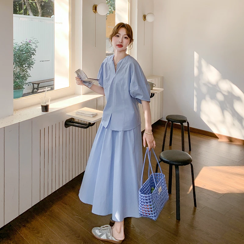 五一出游简单大方蓝色上衣套装女2025夏季新款超好看半身裙两件套