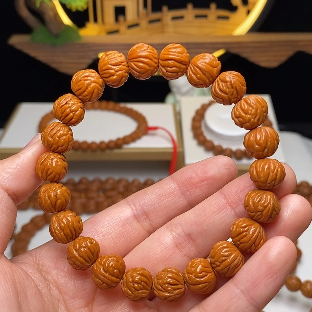 随***便手串桃核12mm野生凤羽聚宝盆桃核手串