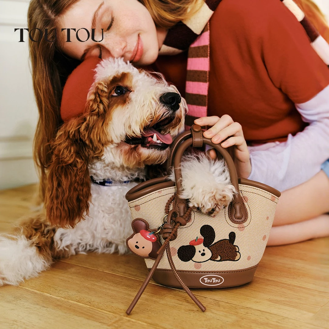 TOUTOU小狗手提菜篮子包可爱水桶包2025新款单肩斜挎包女
