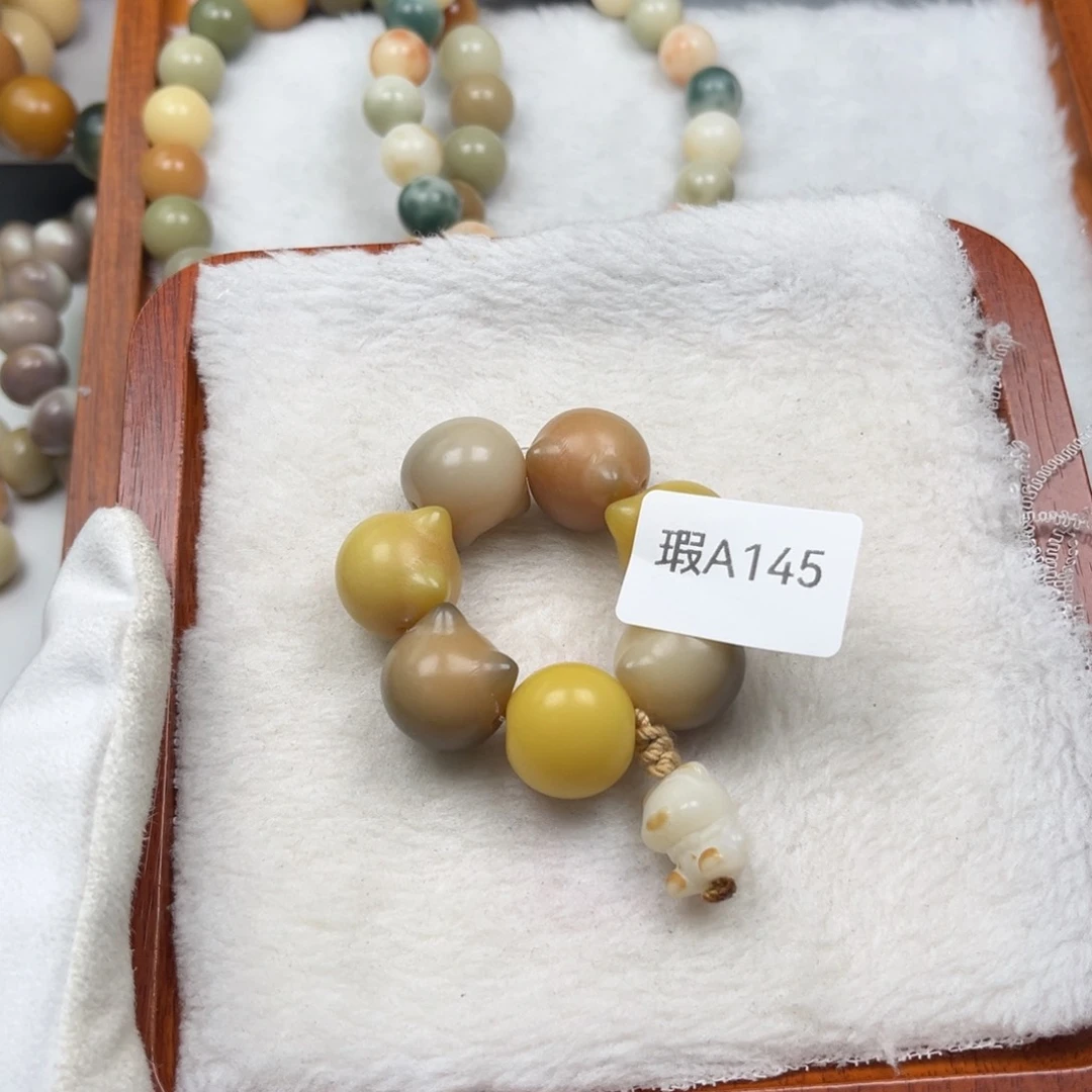 菩提根/象牙果吊坠新瑕A145猫头手捻15mm一串