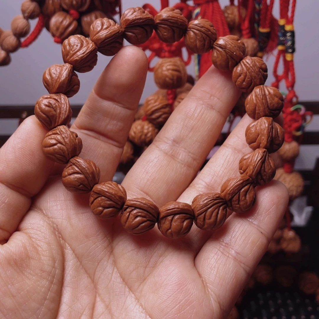 木质类龙纹桃枭手串