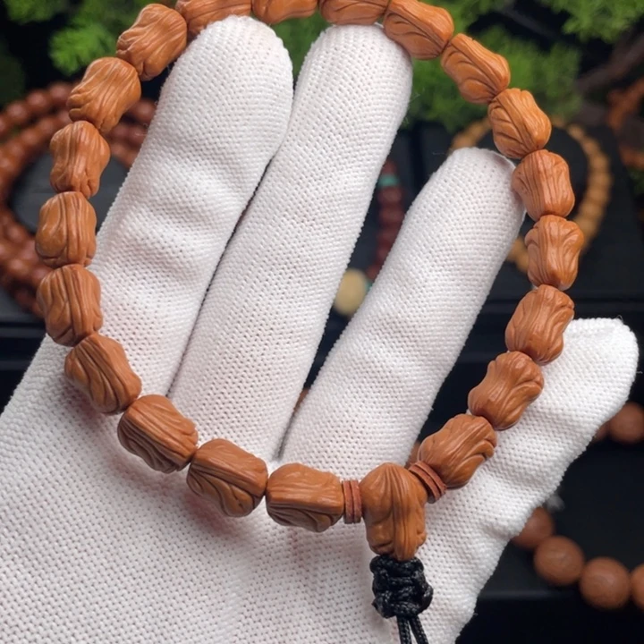 *****桃核吊坠精品手持