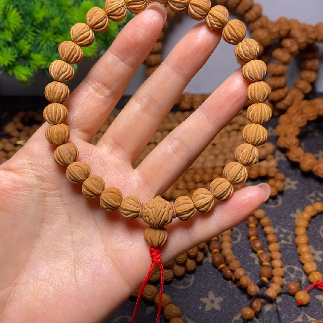 宏***艺桃核手串秦岭桃核