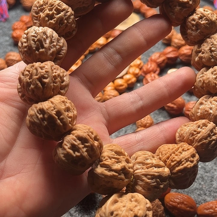 老***穆吊坠文玩核桃福利串
