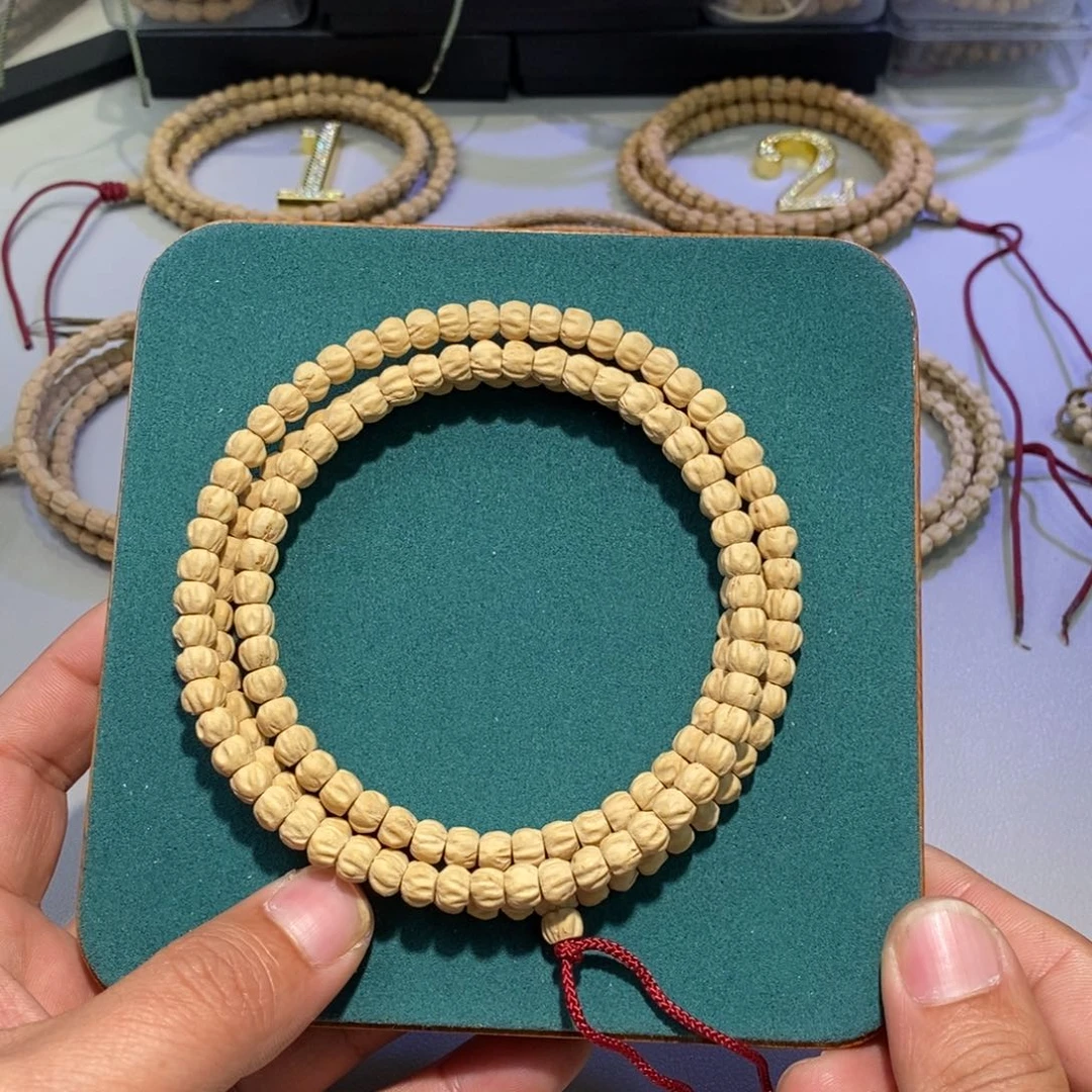 柏香籽/百香籽吊坠l****莲花