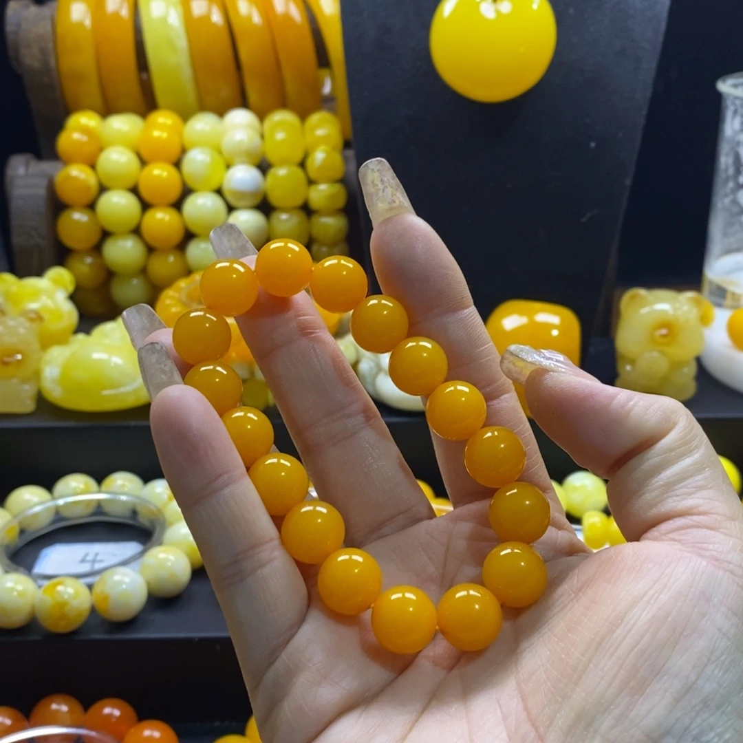 莉***莉非金属老蜜12手串