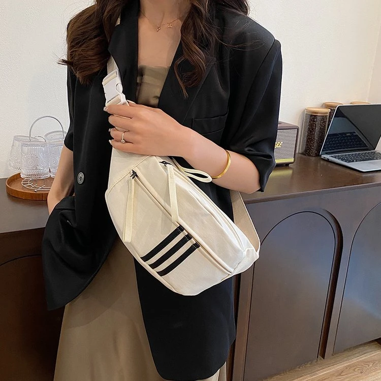 潮牌时尚腰包运动斜挎胸包男女2025新款时尚百搭休闲帆布包单肩包