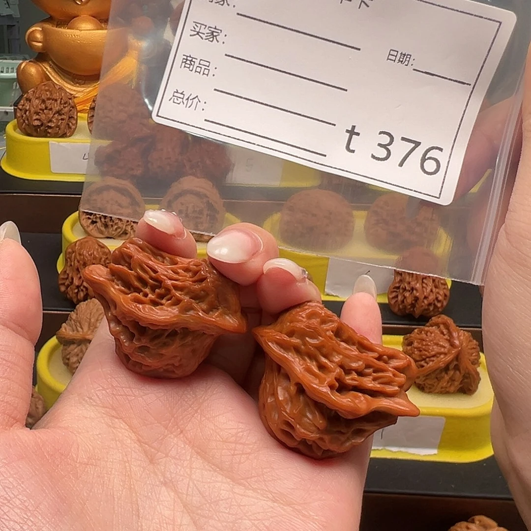 伊***爸文玩核桃手把件鸟