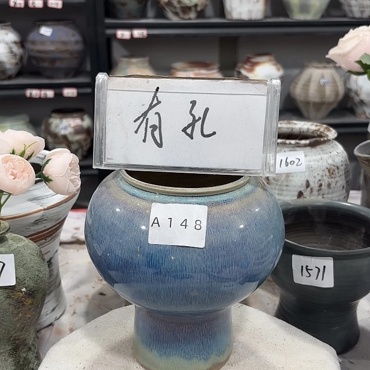 摆件高20，口10，有孔148