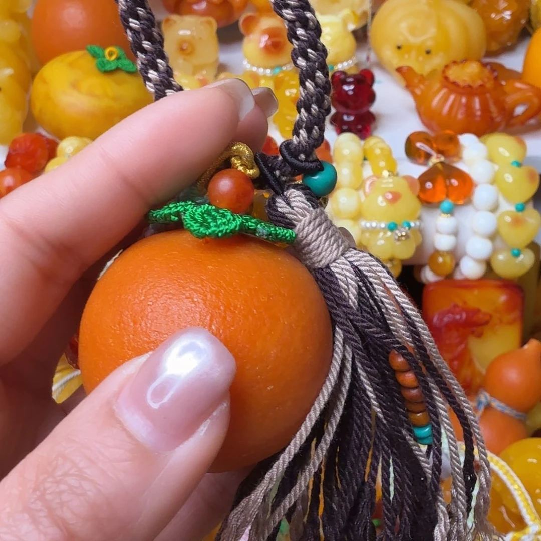 郭***姐非金属包包挂橘子