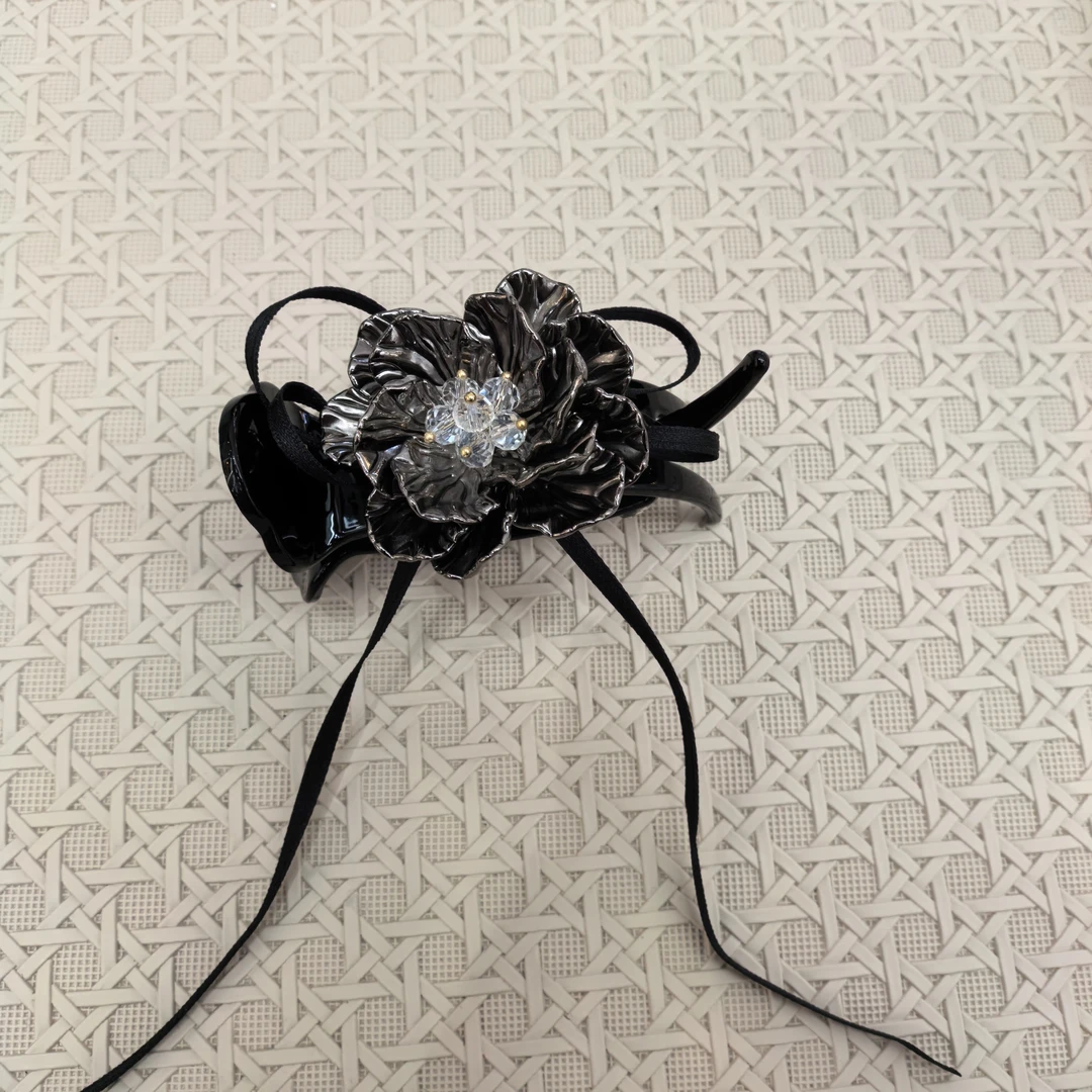 D011黑色花花星星闪闪AB面丸子抓夹