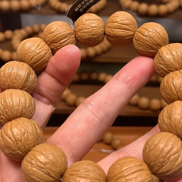 文玩核桃吊坠小*生聚宝盆