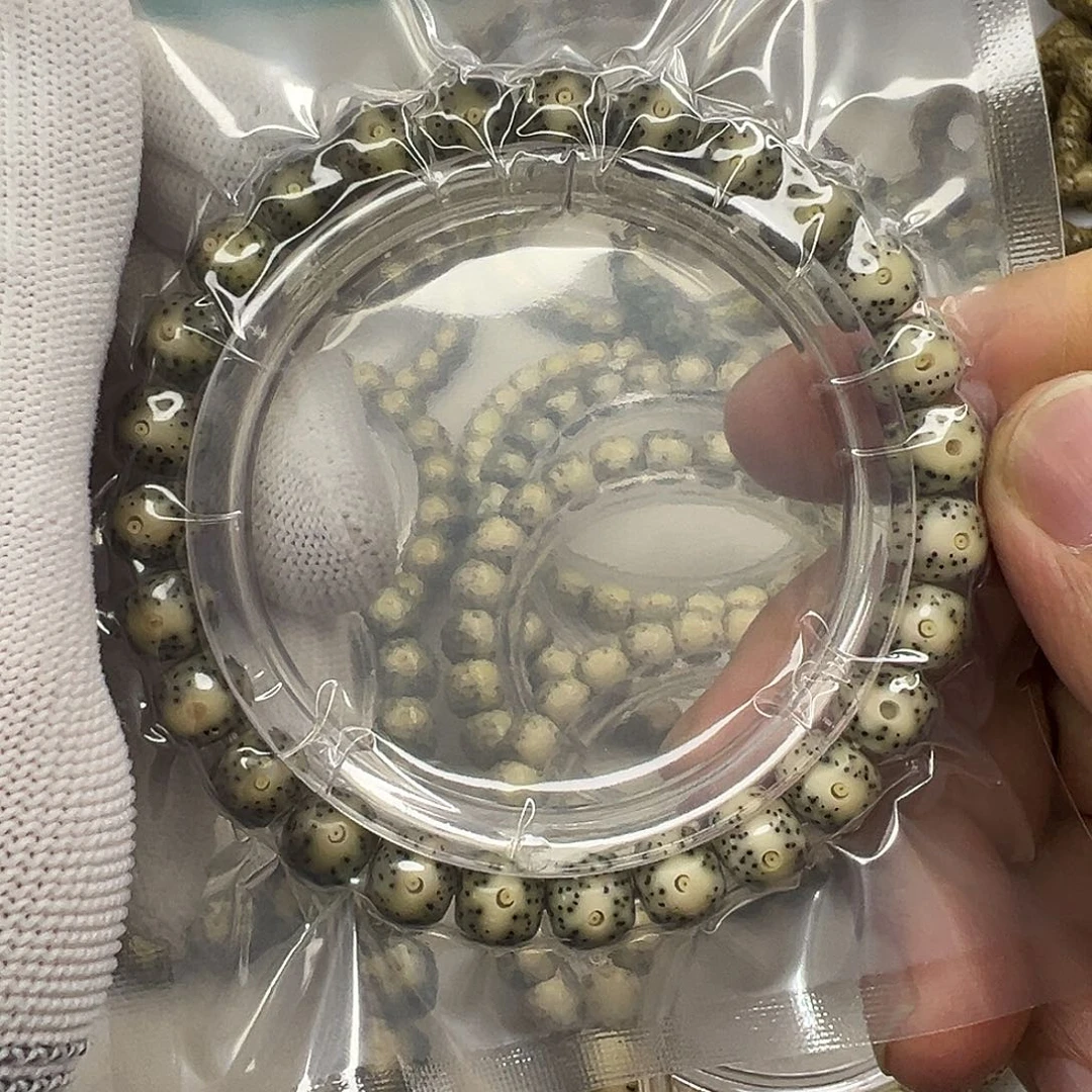 手串星月菩提8.5×7绿包白眼睛  092