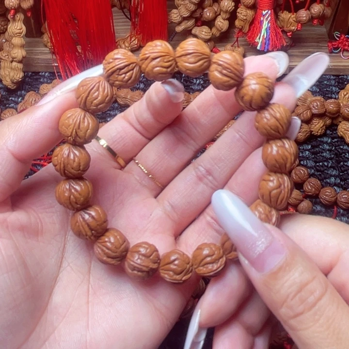 木质类龙纹桃枭手串