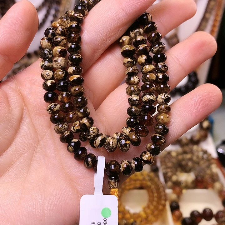 辣***椒琥珀未镶嵌裸石抚顺琥珀6+359