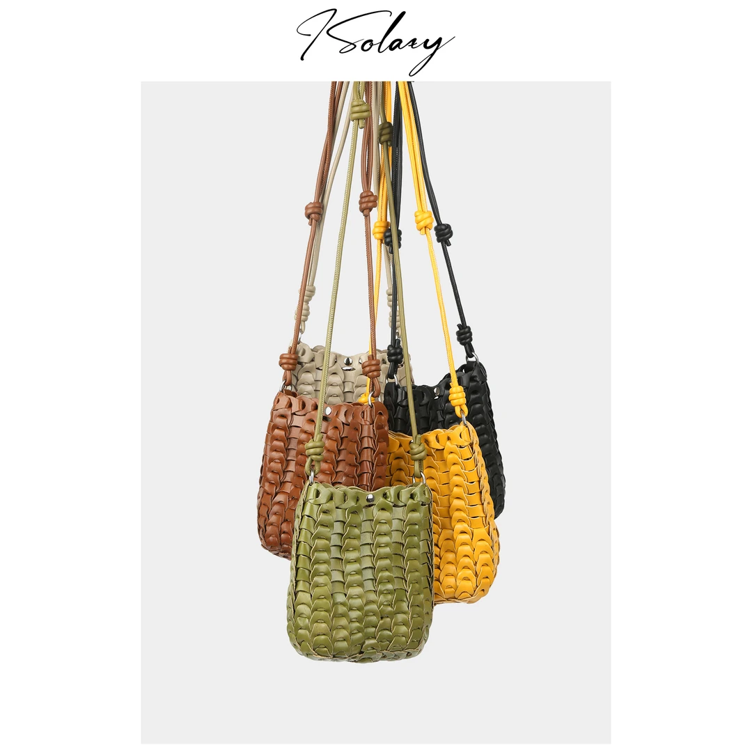 isolazy/“铜钱”小众设计原创编织手机包单肩头层牛皮高级感镂空