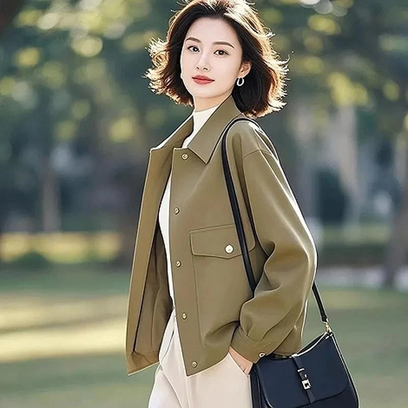 今年流行的新款独特漂亮高级小众不撞款绿色外套女2025年新款春季