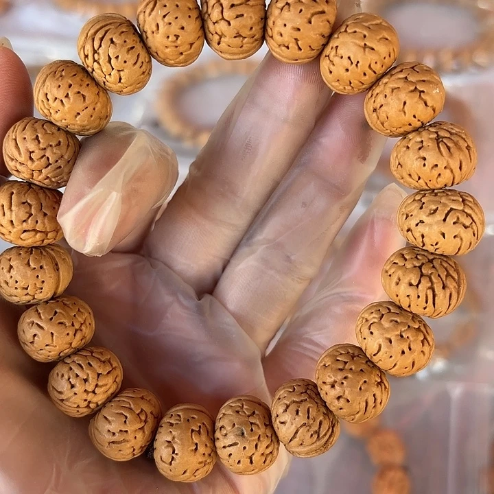 桃核手串野生小桃核纽扣。