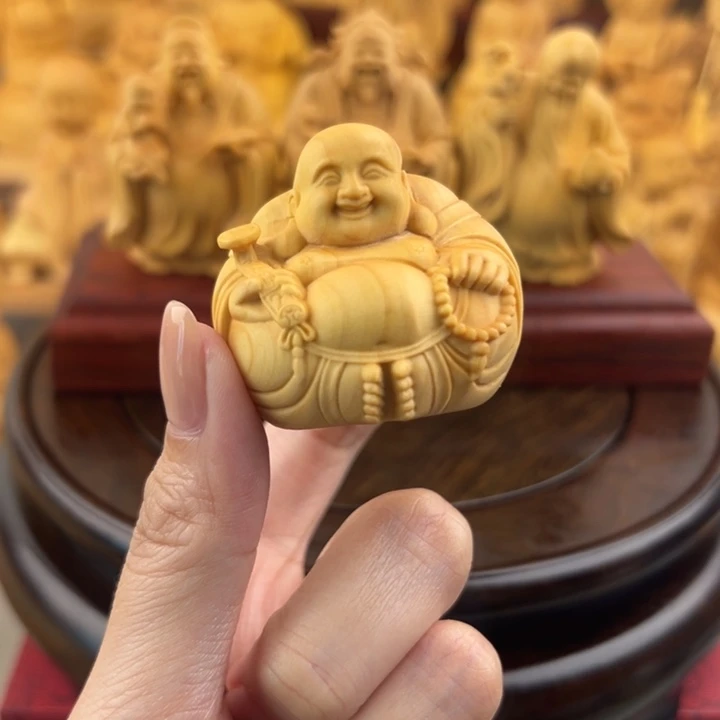 黄杨木小号一团和气手把件