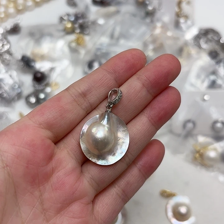 玲***-未镶嵌拼合珍珠（马贝珠）颈饰