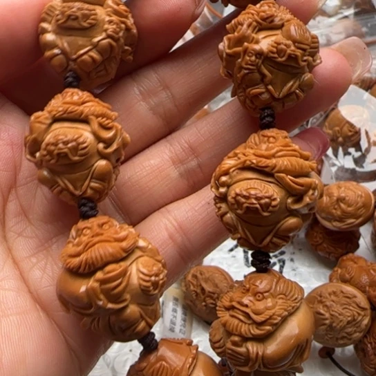 孙***伍橄榄核手串橄榄雕工艺品