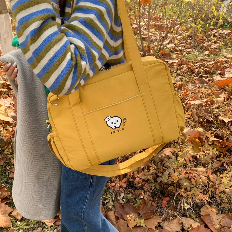 学院风可爱少女手提包日系纯色百搭通勤单肩包女简约斜挎包小书包