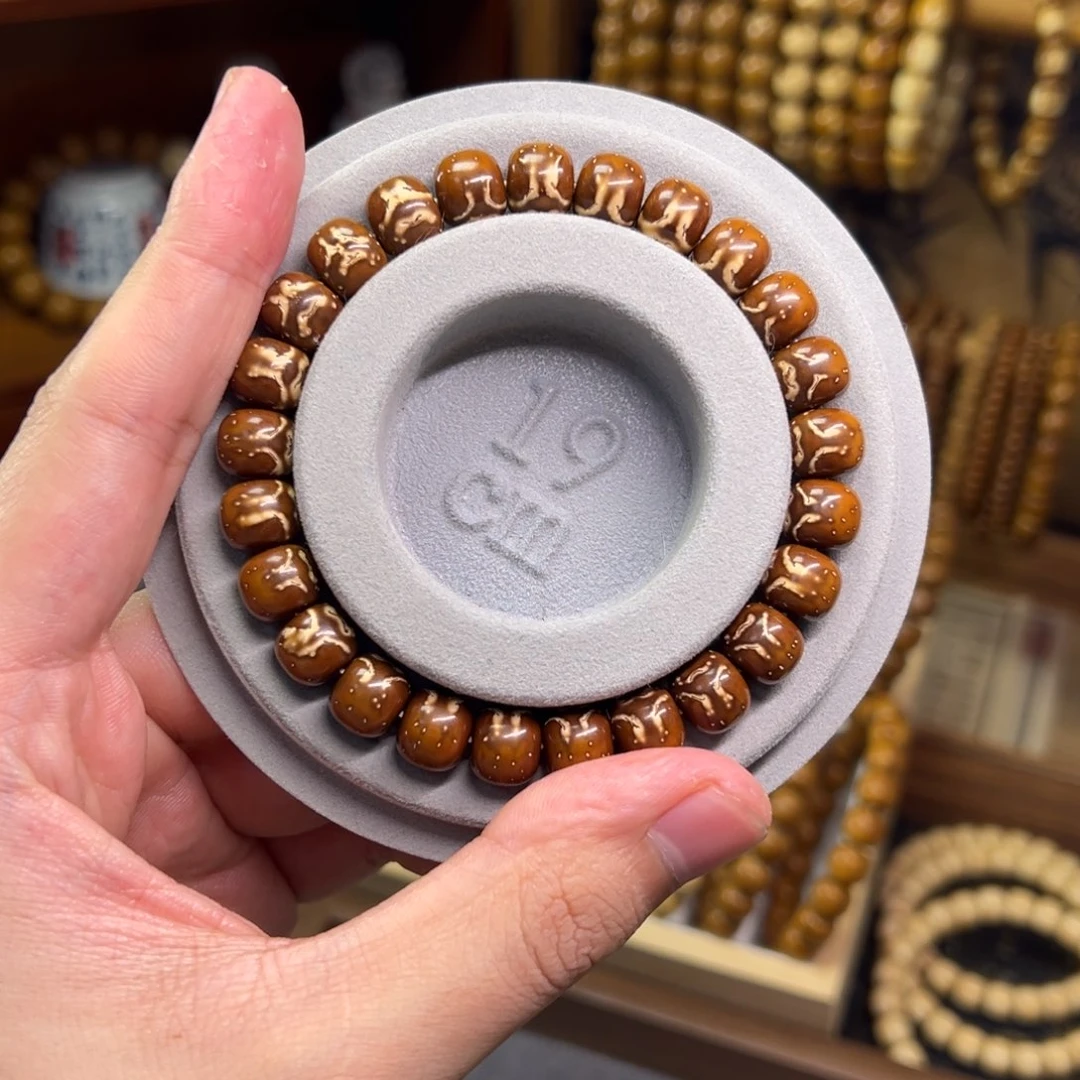 龙****非金属紫金鼠9.9*8.5实心鬼脸老型精品