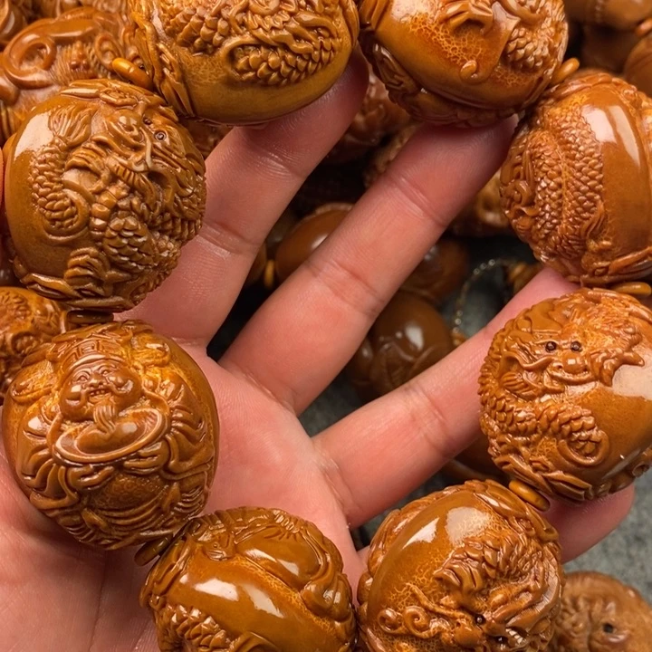 橄榄核吊坠可****石橄榄核手持