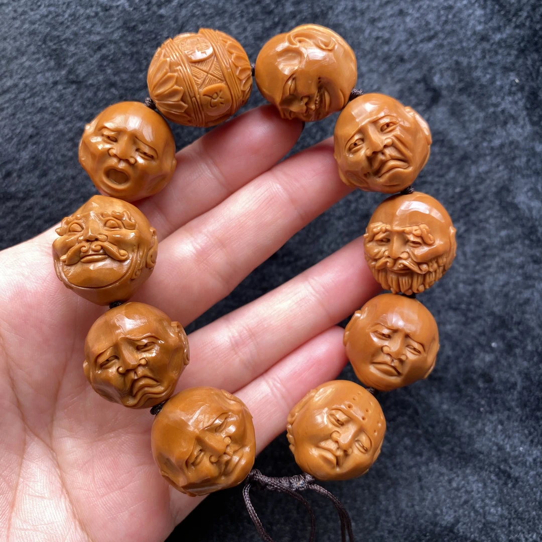 须派罗汉    橄榄核雕刻文玩手串