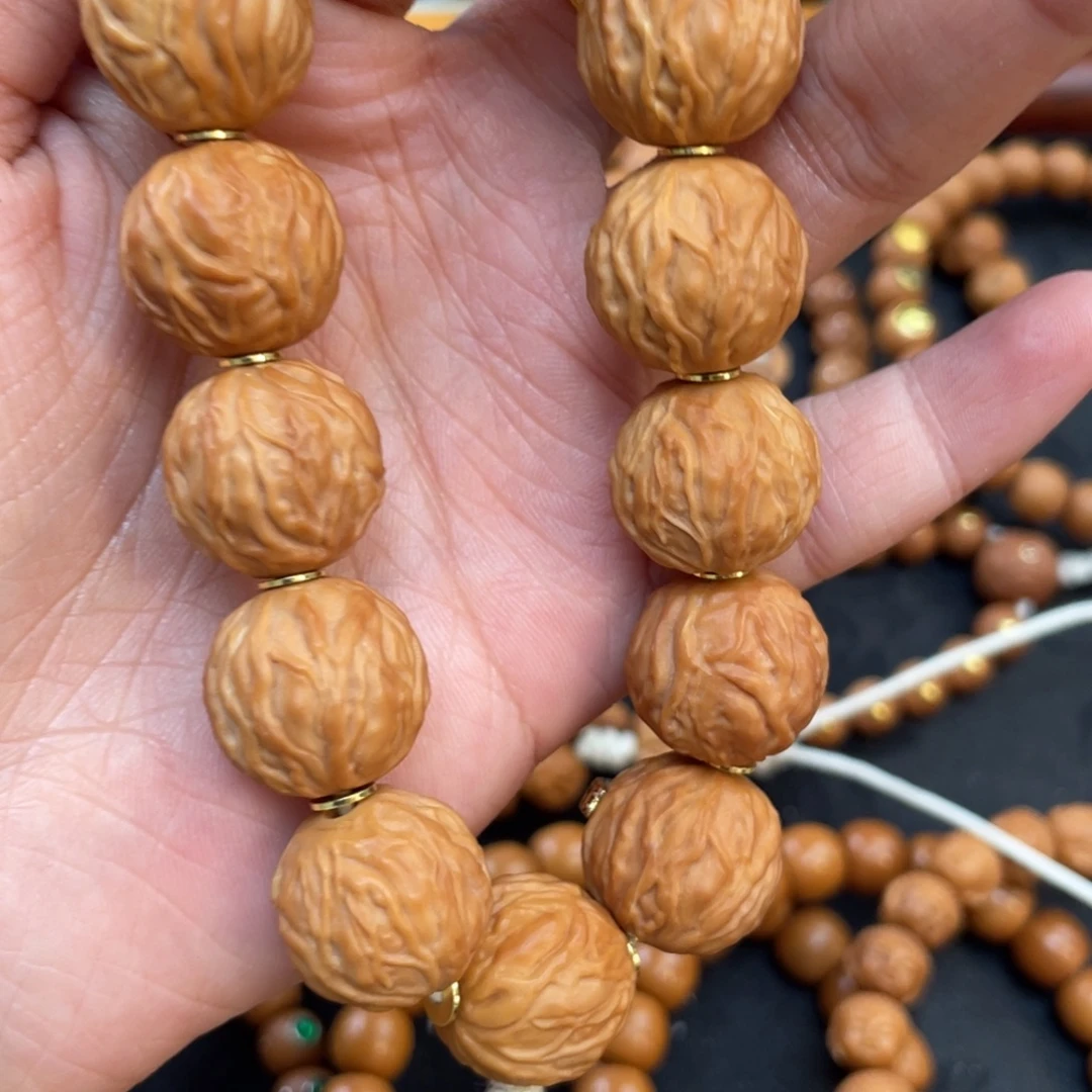 小***爸猴头核桃吊坠全品毒液手持素的