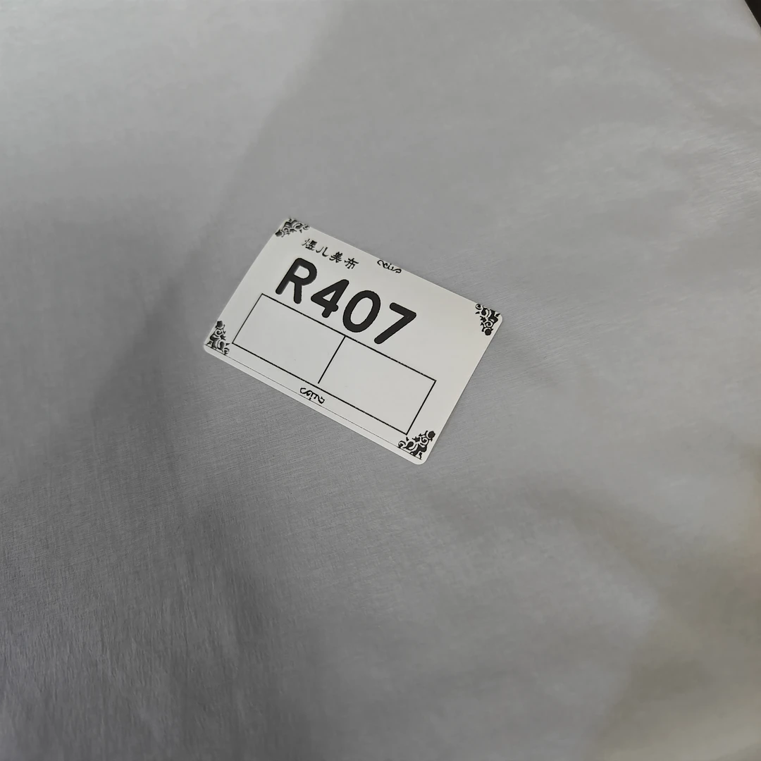 407浅泥灰塔丝隆布料