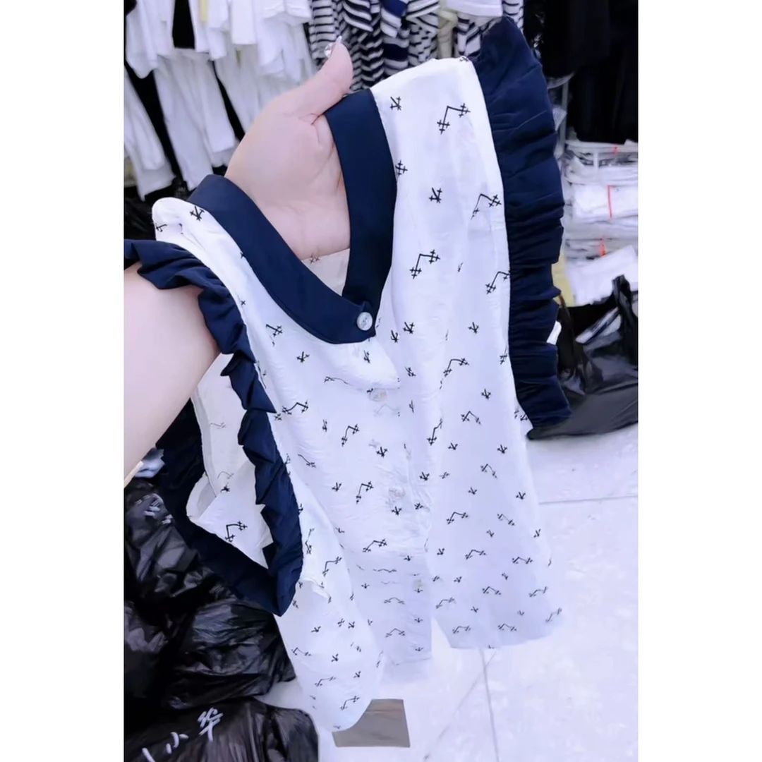 今年流行穿搭2025夏季新款温柔风图案印花宽松减龄木耳边无袖上衣