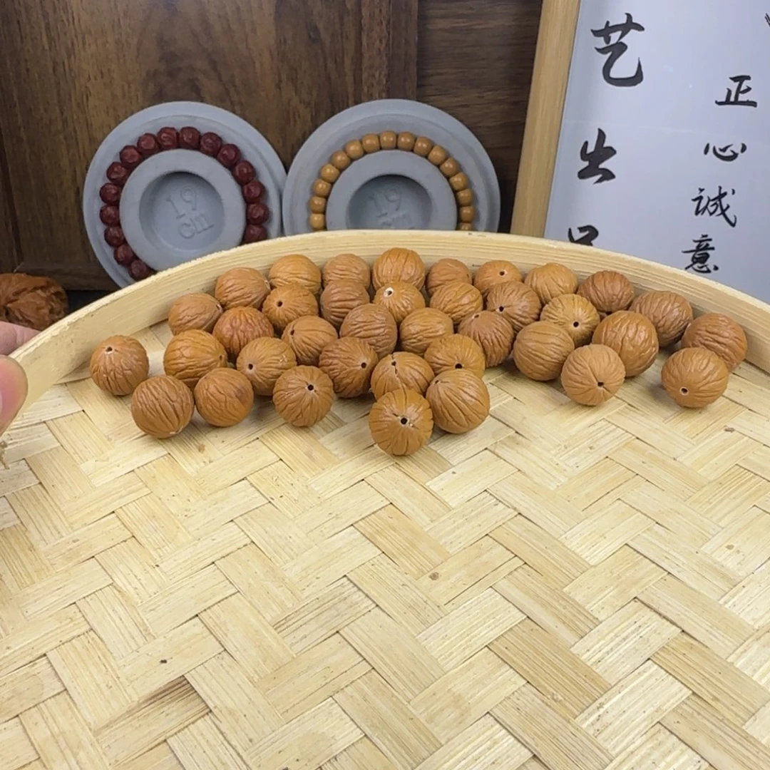 夜****猴头核桃手串凤羽原皮