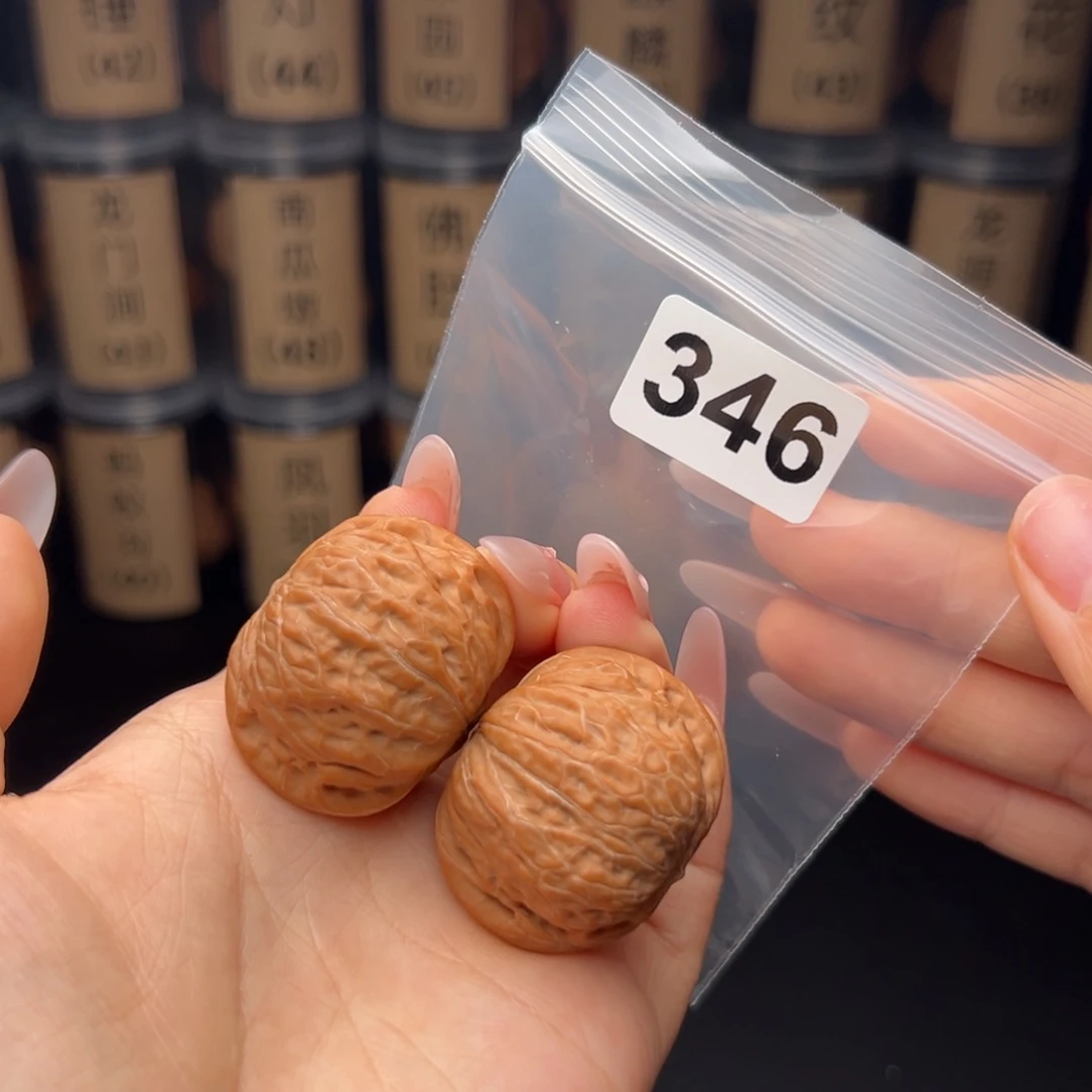 苏***璇文玩核桃吊坠铁锤