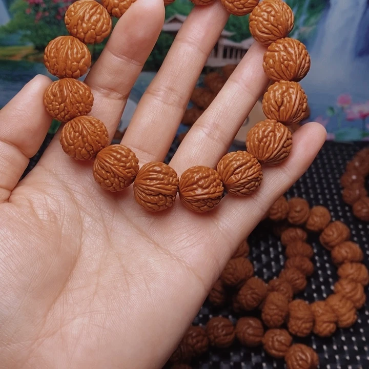 桃核手串還*誰龙纹桃核
