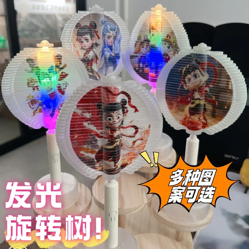 新款夜光旋转树脸谱哪吒造型螺旋树棒棒糖解压益智手摇玩具数列