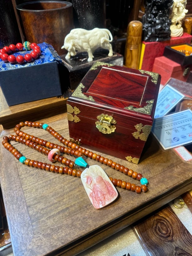 木12345脖挂一物一拍带油梨盒