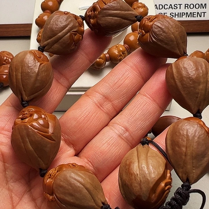 稳***。橄榄核手串/手链包衣弥勒