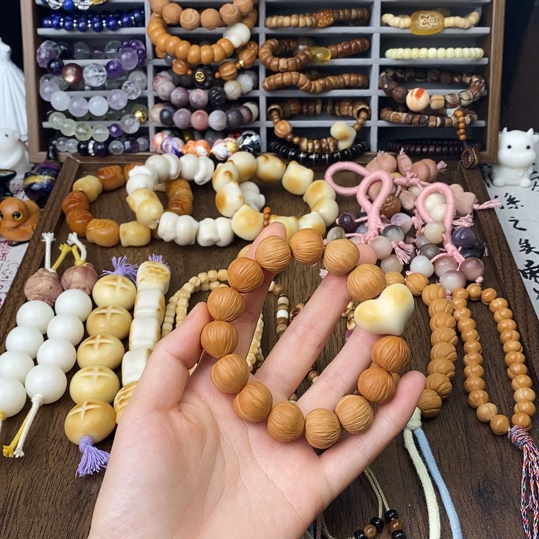 白玉菩提吊坠猴头拉丝屁桃