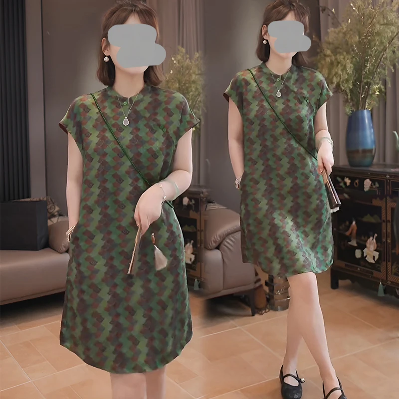 绿色圆领短袖连衣裙女2025夏季新款独特撞色印花设计感大码裙子潮