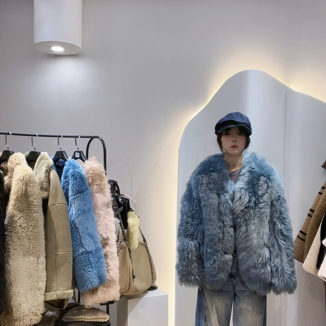 真皮皮毛一体外套223-3386。115斤内