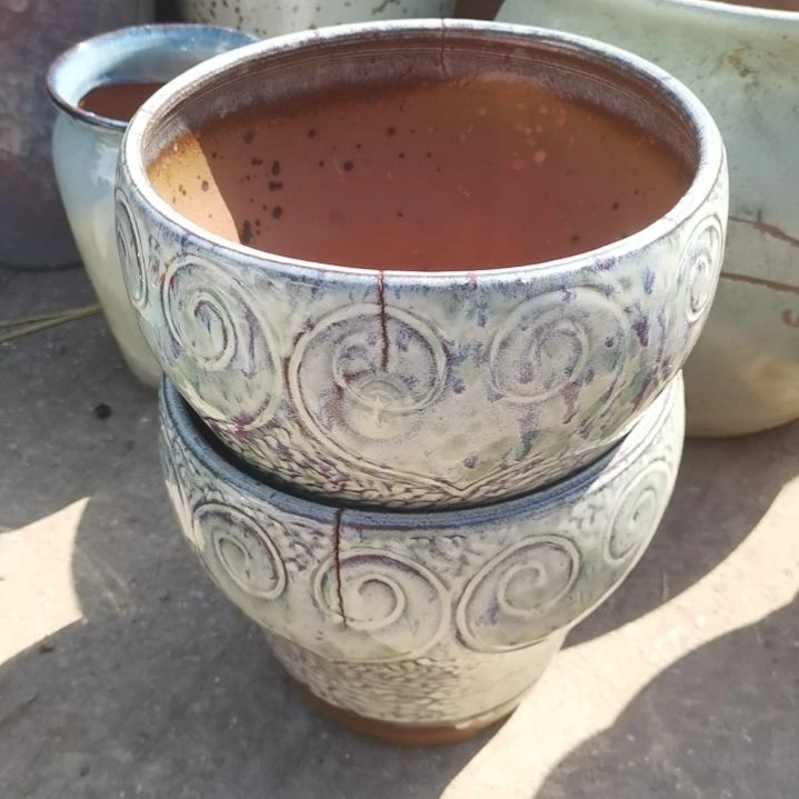 红陶口20高18瑕疵口裂