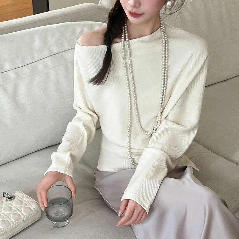 春季新款韩版慵懒风气质一字斜肩蝙蝠衫休闲百搭黑白两色白衬衫