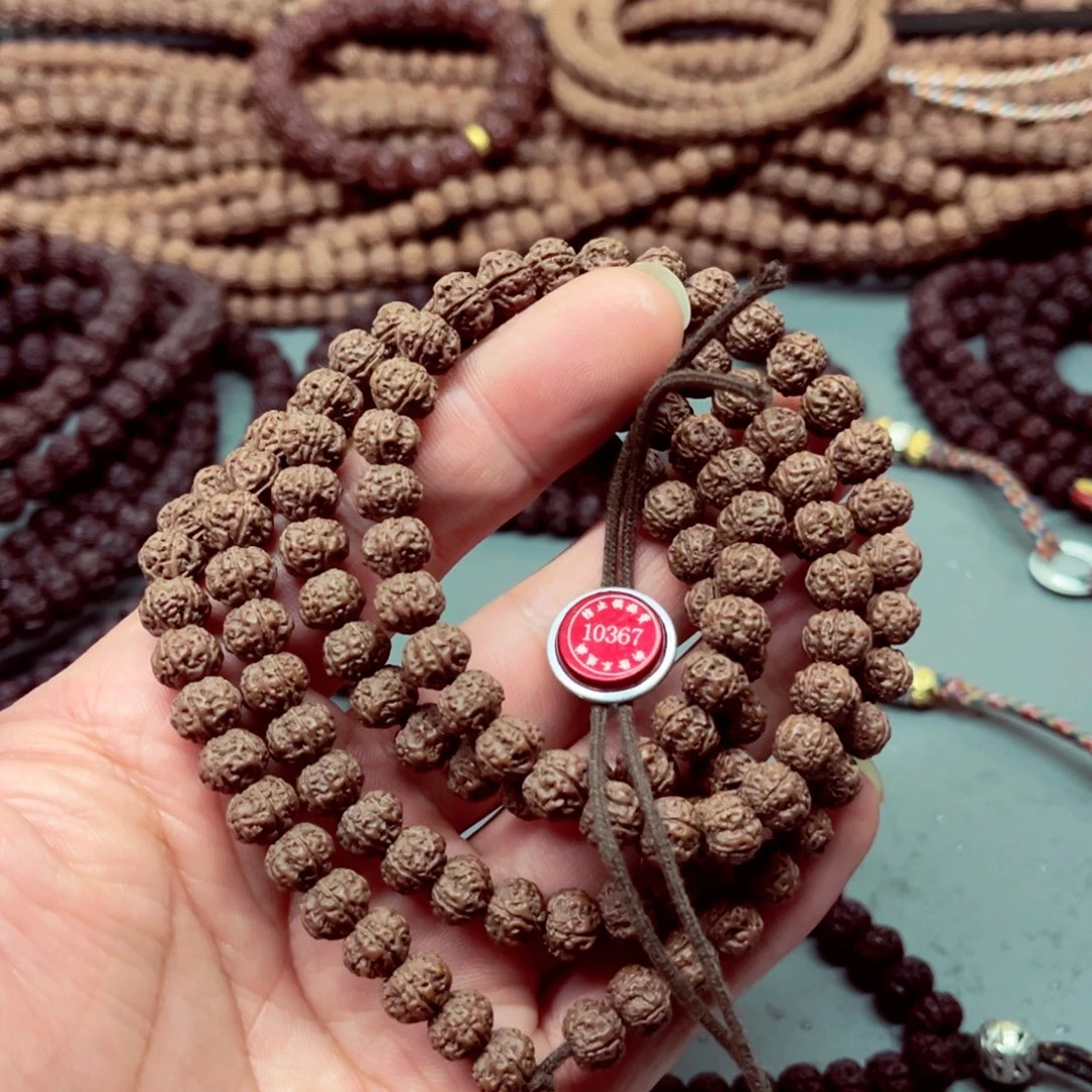 金刚菩提手串8勿里达紫皮梅花10367