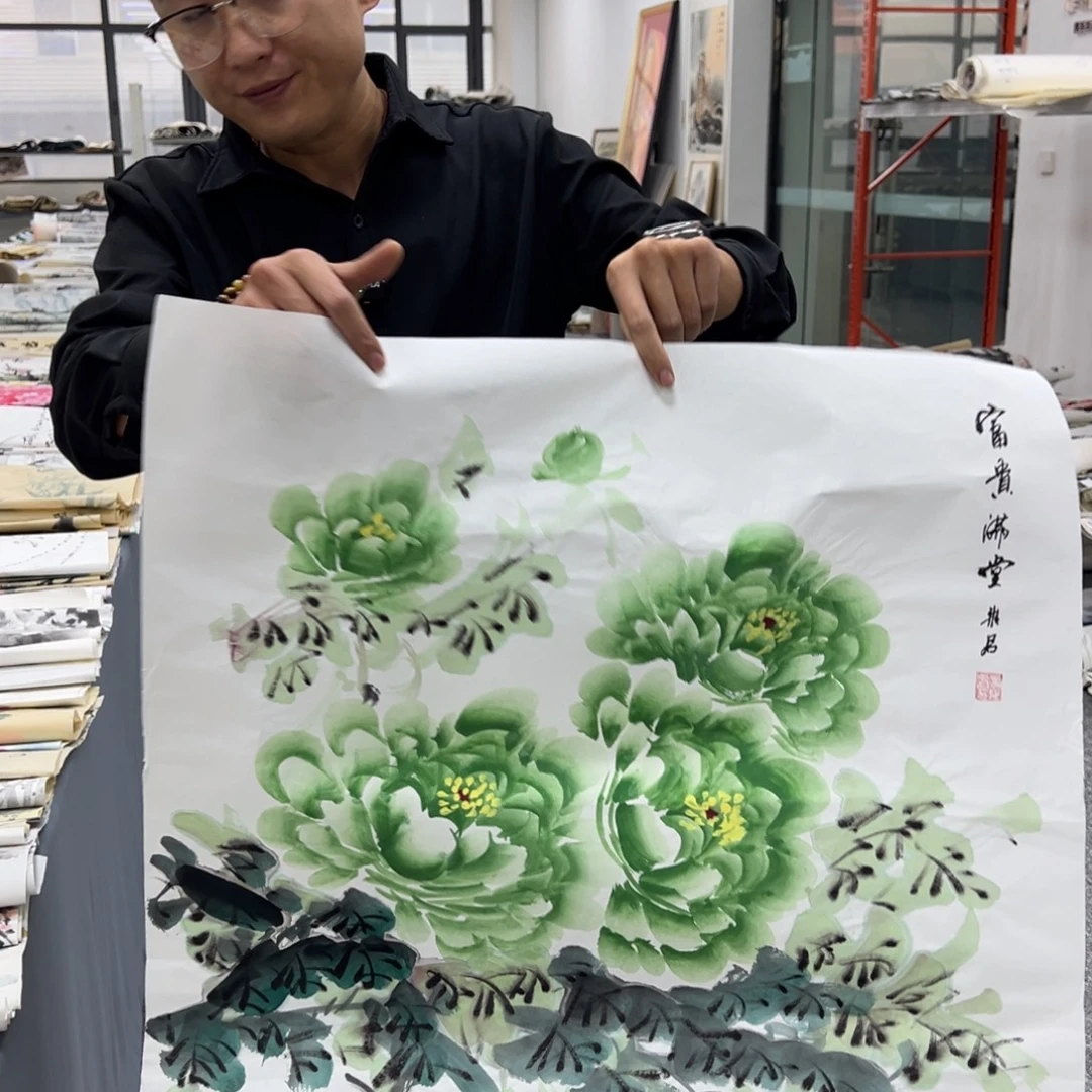 国画卖字画的小男孩