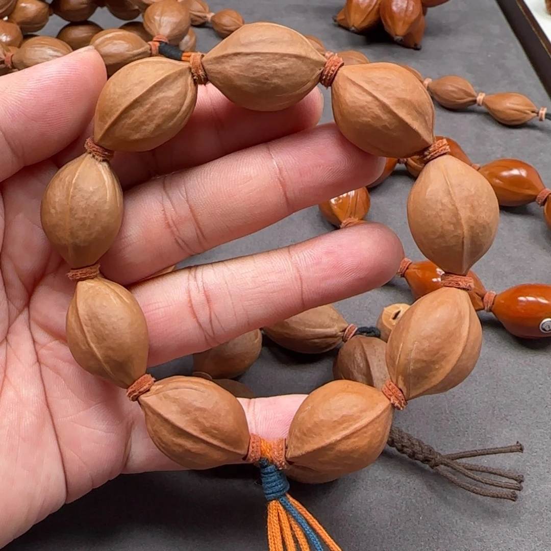 手串橄榄核1.9x2.8 精挑原生态梅林铁核