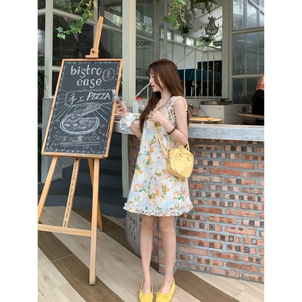 宋卡后花园 木耳边碎花连衣裙女2025夏甜美度假风无袖