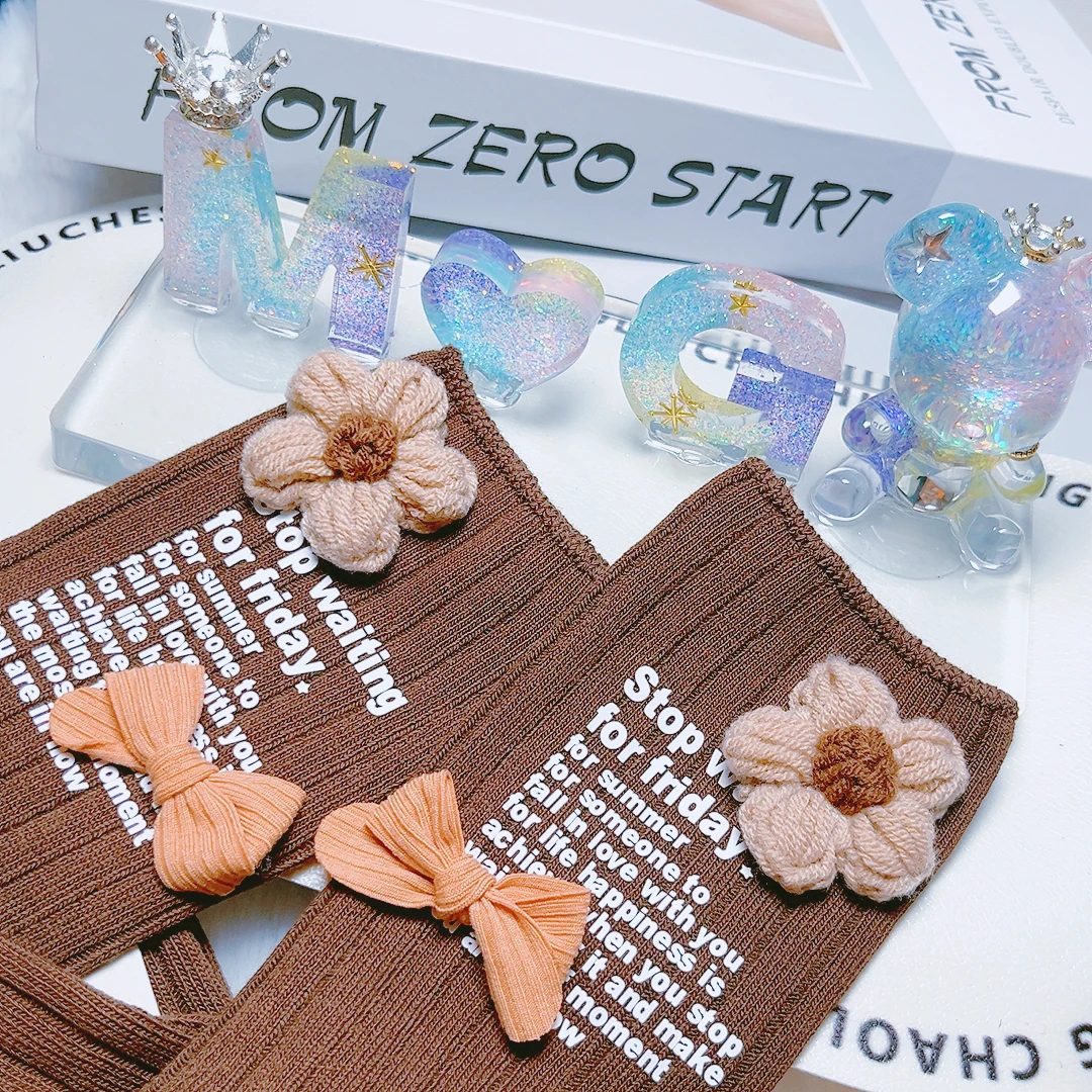 韩版中筒袜子立体花朵烫印字母蝴蝶结潮袜外穿好看甜美饰品袜中筒