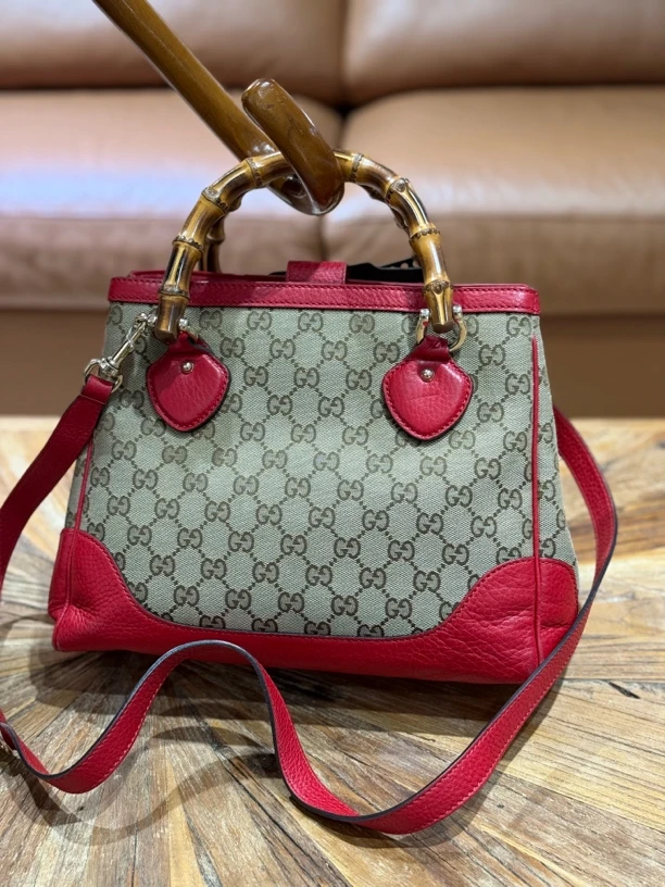 95新 GUCCI/古驰 帆布拼皮竹节手提斜挎包12589