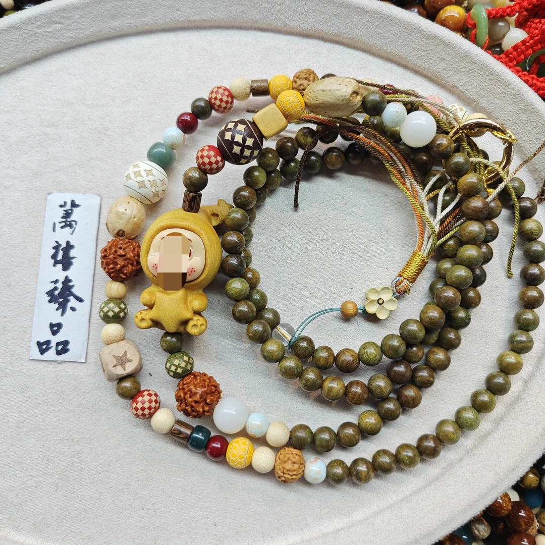 小星人绿檀手机斜挎F481 hn